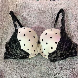 White and black polka dot and lace bra